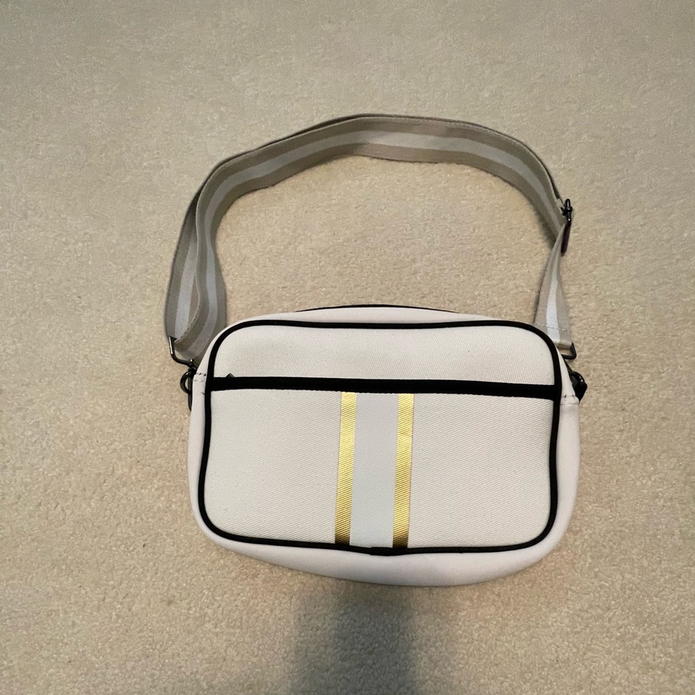 brand new beige gold bc handbag with tags
